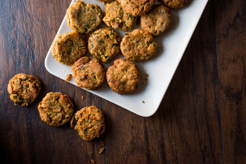 Fried Chickpeas Falafel on wooden surface.