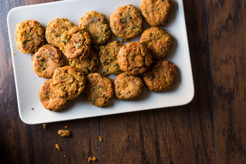 Fried Chickpeas Falafel on wooden surface.
