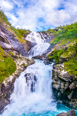 Naklejka na ściany i meble Giant Kjosfossen waterfall in Flam - Norway