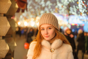 red-haired girl in christmas, outdoor