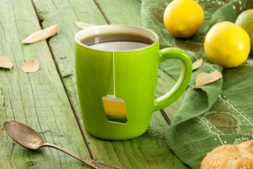 green tea cup over table