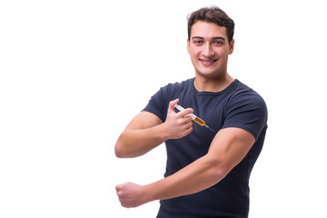 Young man in doping concept isolated on white