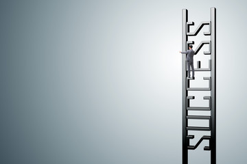 Businessman climbing the career ladder of success