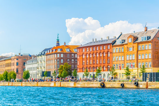 View of a promenade leading alongside the channel in central Copenhagen, Denmark.