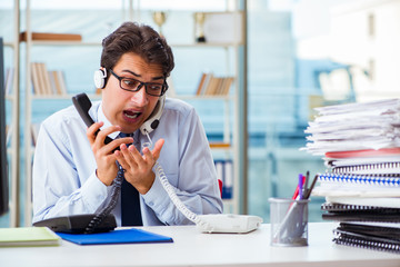 Unhappy angry call center worker frustrated with workload