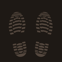 footprints silhouette on dark