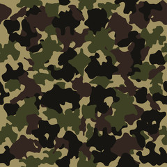 Fototapeta premium Camouflage seamless pattern. Fashion design for masking, military style. Green, brown, black, olive colors background. Vector illustration.