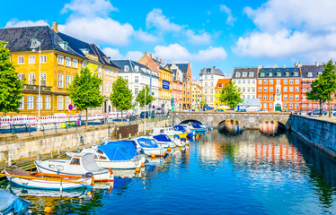View of a channel next to the Christiansborg Slot Palace in Copenhagen, Denmark.