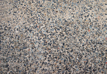 Cement mixed small gravel stone wall or floor texture background