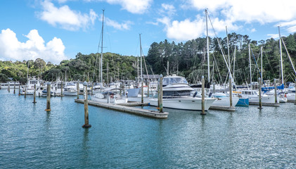 Fototapeta na wymiar Yachts, sail bots and motor launches at Tutukaka Marina in Northland, New Zealand, NZ