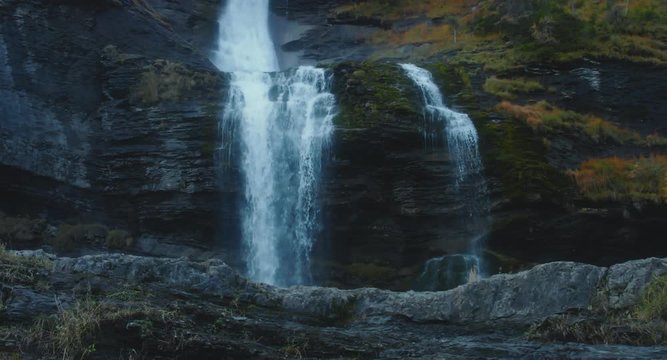 FIXED shot of Cascade du Rouget waterfall in November, French Alps. 4K UHD RAW 60 FPS SLO MO