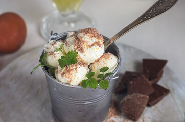 Preparation of homemade dessert from ice cream and chocolate