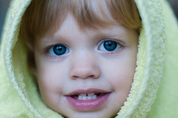 blue-eyed girl after a bath