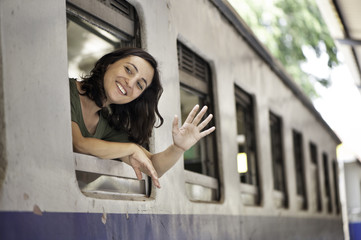 Woman Train Passenger Waving