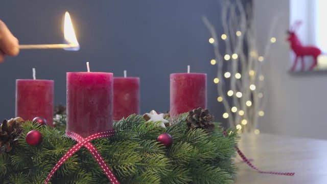 Lighting the candles of an advent wreath - sequence - ProRes