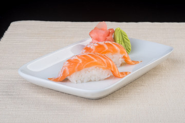 japanese cuisine. sushi salmon on the background