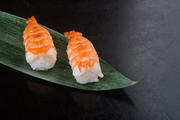 japanese cuisine. sushi shrimp on the background