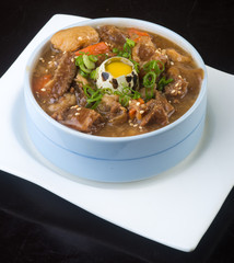 japanese cuisine. beef soup on the background