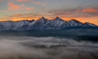 mountain panorama (Tatra Mountains) with multicolored, dramatic sky