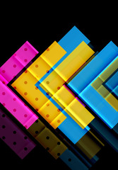 Colorful triangles and arrows on dark background