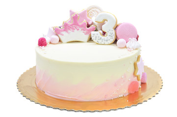 Pink cake for third birthday isolated on white