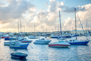 beautiful european harbor with maltese yacht and boat