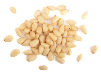 Shelled cedar pine nuts isolated on white background. top view