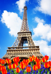 EiffelTower in spring day with flowers in Paris, France, retro toned