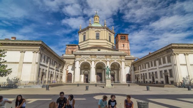 Facade of San Lorenzo Maggiore Basilica timelapse hyperlapse and statue of Constantine emperror in front.