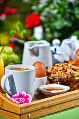 Breakfast served with coffee, juice, croissants and fruits