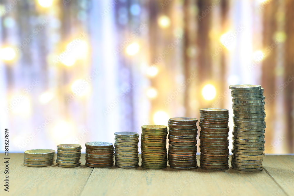 Poster coin stack with blur light dreamy bokeh background. business, finance and saving concept.