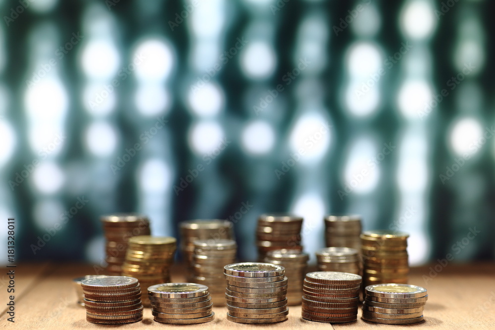 Poster coin stack with blur light dreamy bokeh background. business, finance and saving concept.