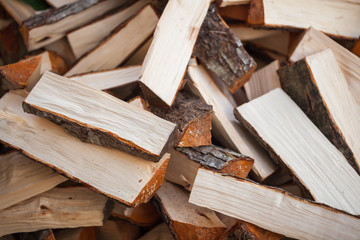 Preparation of firewood for the winter. firewood background.