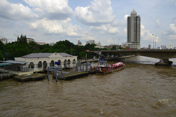 Fototapeta premium The public boat stop at Chaophraya - October, 2017, Bangkok, Thailand