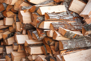 Preparation of firewood for the winter. firewood background.