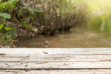 Floor wood background on river and nature.