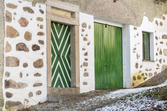 traditional farmhouse with green door