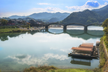 Kintai Bridge with traditional boats. Kintaikyo, Iwakuni, Yamaguchi Prefecture, Japan