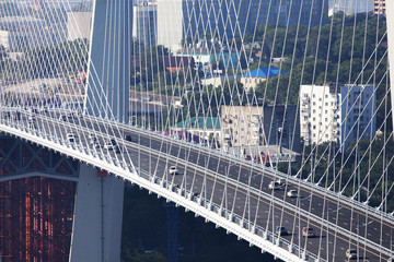 Fototapeta na wymiar The Zolotoy Golden Bridge is cable-stayed bridge across the Zolotoy Rog (Golden Horn) in Vladivostok, Russia