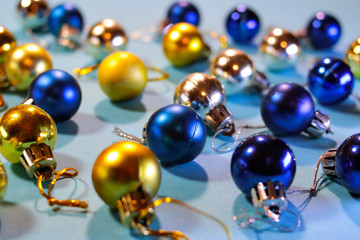 New Year and Christmas toys on a blue background.