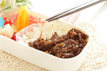 Homemade beef  on rice packed lunch Obento