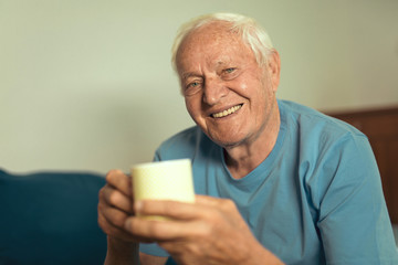 Portrait of senior man  at home