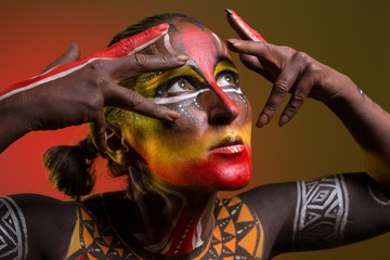 Bodypainting. Woman painted with ethnic patterns