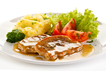 Fried pork chop, puree and vegetables