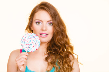 Woman joyful girl with lollipop candy