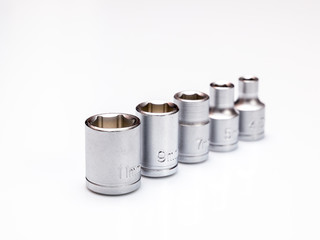 set of interchangeable heads for chrome socket wrench. Isolated on white background.