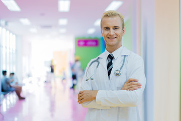 happiness smart doctor with blur clinic hospital blur background