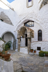 Fototapeta na wymiar Architecture of the monastery of Saint John the Theologian in Patmos island, Dodecanese, Greece 