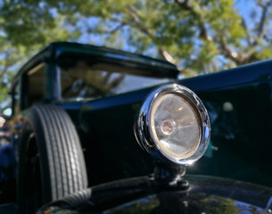 Metal headlamp of vintage classical car