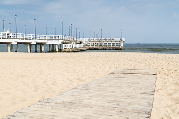 View of the Brzezno Pier and Beach in Gdansk, Poland, on a sunny day in the autumn.